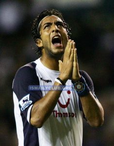 Tottenham Hotspurs' Mido reacts after missing a shot on goal during the English Premier League soccer match against Fulham at White Hart Lane in London, England September 26, 2005. NO ONLINE/INTERNET USE WITHOUT A LICENCE FROM THE FOOTBALL DATA CO LTD. FOR LICENCE ENQUIRIES PLEASE TELEPHONE +44 207 298 1656.   REUTERS/Eddie Keogh Picture Supplied by Action Images *** Local Caption *** 2005-09-26T194250Z_01_LON802D_RTRIDSP_3_SPORT-SOCCER.jpg